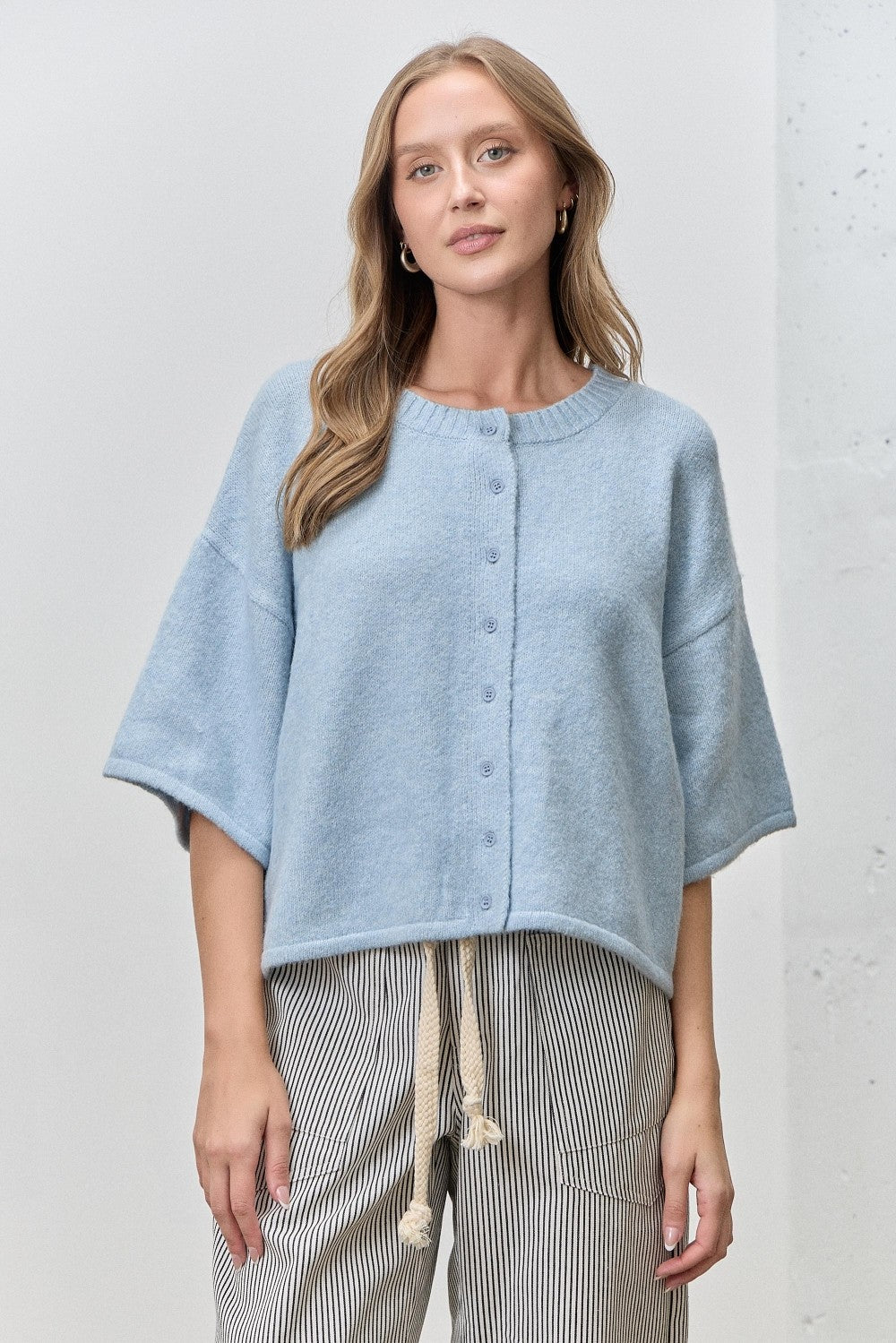 Baevely Lauren button-down cardigan top from the 131 Spring Sweaters collection, featuring a classic design with buttons and a soft fabric.
