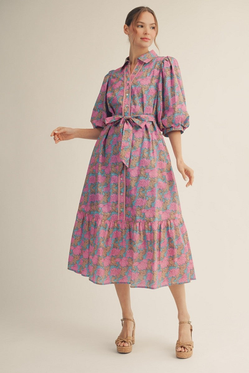 JODIFL Carrie floral tie-waisted midi dress with a flowy silhouette and vibrant floral pattern, perfect for dressy occasions.
