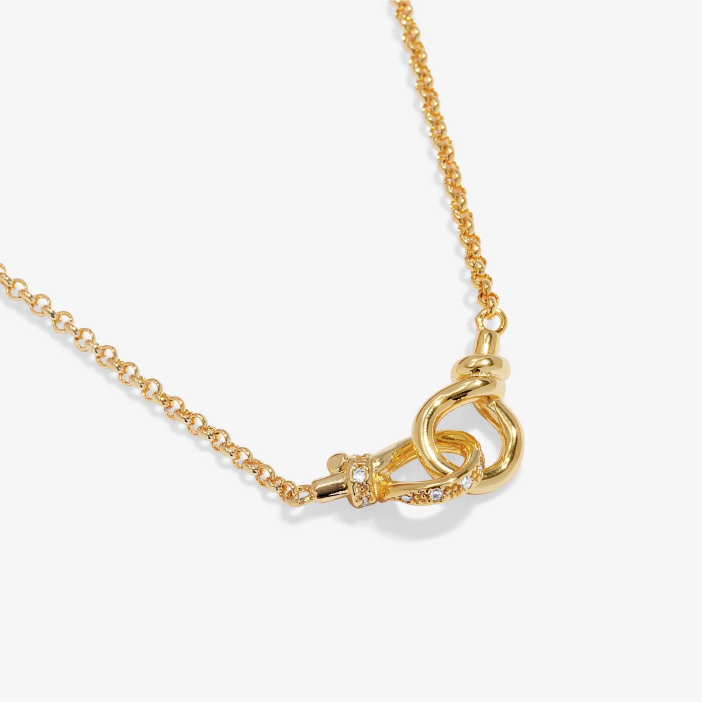 A LITTLES & CO Evermore Linked Knot 15 3/4-inch necklace with a delicate linked knot design, silver-toned jewelry on a neutral background.