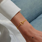 A LITTLES & CO Evermore Linked Circles bracelet featuring interconnected silver loops on a delicate chain.