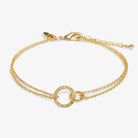 A LITTLES & CO Evermore Linked Circles bracelet featuring interconnected circular links in silver-tone jewelry.