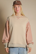 VERY J Patsy striped contrasted sleeve top from Fall 2026 collection, featuring bold stripes and contrasting sleeve design.