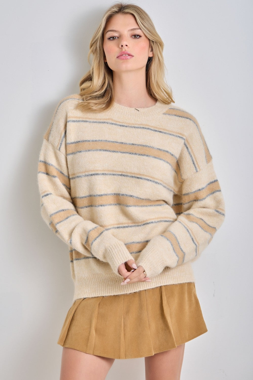 Baevly Katrina multi-striped fall sweater featuring colorful horizontal stripes and a cozy knit texture.