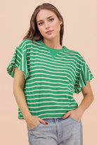 Pamela Green Ruffle Sleeve Top by VERY J, casual 105 top with feminine ruffle sleeves and relaxed fit, displayed on a hanger.