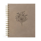 Undated 12-month planner by HOSANNA REVIVAL featuring a sleek design, ideal for organizing appointments and plans.