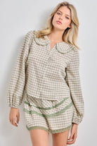 Baevely Manny plaid button-up sweater in fall-inspired colors, featuring a classic plaid pattern and button-front design.