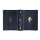 HOSANNA REVIVAL NLT Versailles Notetaking Bible with 218 accessories, open showing lined pages and decorative cover design.