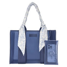 Casemate Jelly Tote in navy with Twilly scarf accessory, stylish clear accessory bag for everyday use and organization.