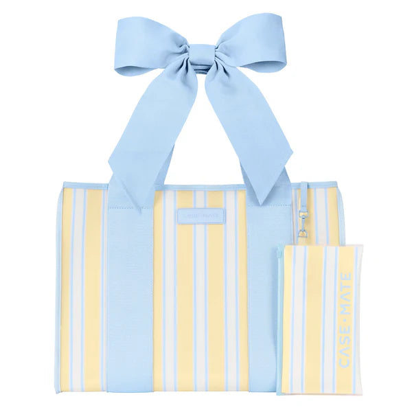 Casemate Jelly Tote in cabana stripe with clear jelly material, featuring a bow detail, designed for stylish accessories.