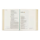HOSANNA REVIVAL NLT Lisbon Theme Notetaking Bible with 218 accessories, open to show pages and decorative design.