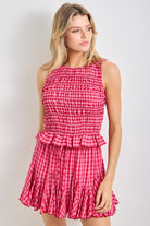 Caroline Fuchsia Smocked Top by BAEVELY, vibrant pink casual top with smocking detail, short sleeves, and a flattering fit.