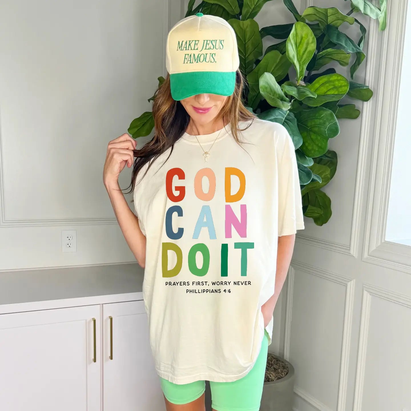 Poppy & Pine God Can Do It graphic T-shirt featuring bold text and vibrant design, casual wear for spiritual inspiration.