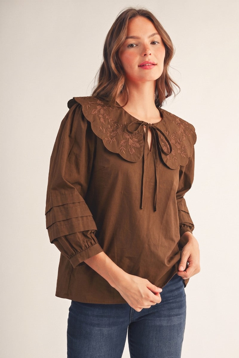 Jodifl Becky Peter Pan collar top with long sleeves and button details, stylish dressy top for women.