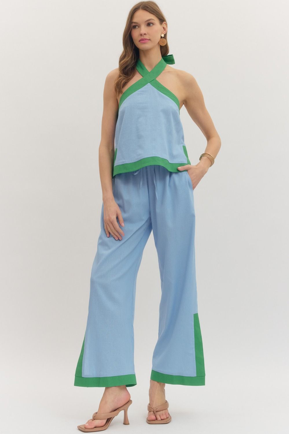 ENTRO Coy contrasted trim dressy top featuring a stylish design, perfect for elegant occasions and sophisticated fashion statements.