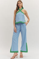 ENTRO Coy contrasted trim dressy top featuring a stylish design, perfect for elegant occasions and sophisticated fashion statements.