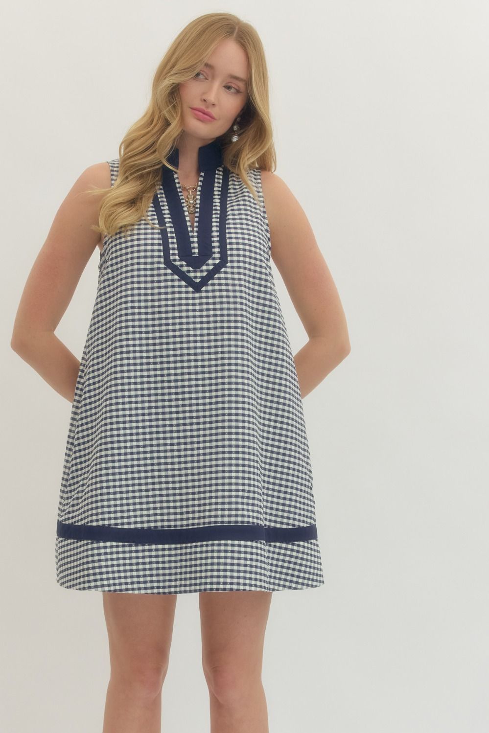 Corinne Plaid Sleeveless Dress by ENTRO, stylish 125 dressy dress featuring a plaid pattern and sleeveless design.