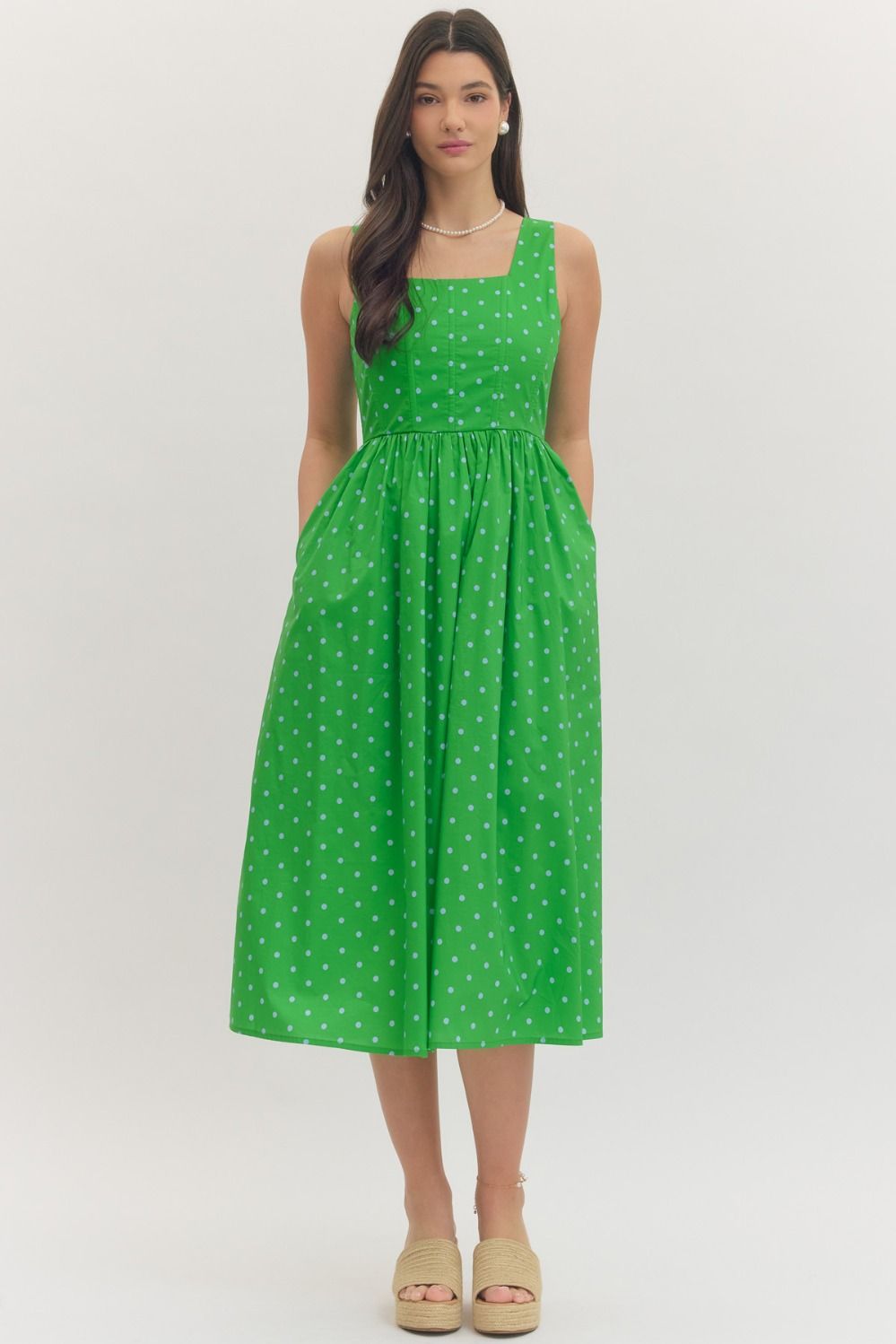 ENTRO Jackie Polka Dot Midi Dress featuring a classic pattern, casual fit, and elegant design perfect for everyday wear.
