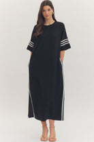 Black and white striped ENTRO Junie midi dress with contrasting sleeve details, stylish casual dress for everyday wear.
