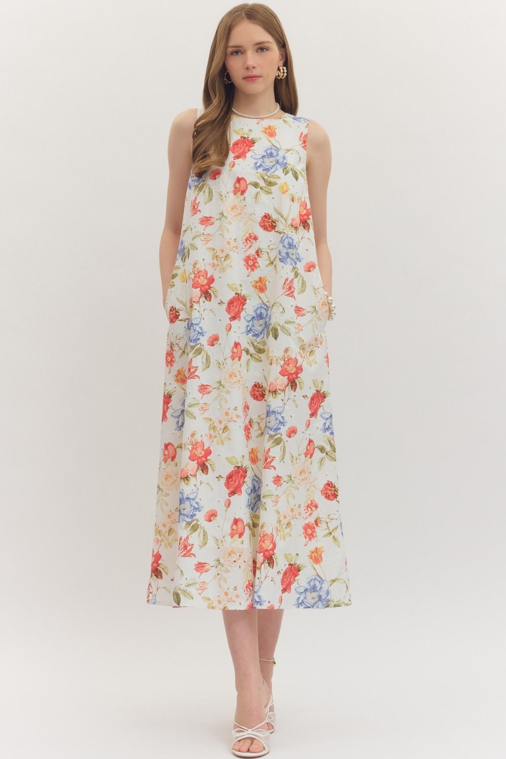 Red botanical floral midi dress by ENTRO, featuring a flowy silhouette and vibrant floral pattern, perfect for dressy occasions.