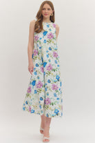 Blue botanical floral midi dress by ENTRO featuring a flowy silhouette and elegant design, perfect for dressy occasions.