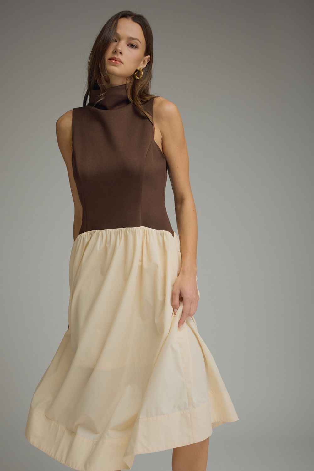 ENTRO Chloe Two Toned Mock Neck Midi Dress featuring a stylish, fitted design with contrasting tones for a chic look.