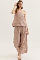 ENTRO Kyle Polka Dot Wide Leg Pants, stylish 156 pants featuring a polka dot pattern and wide-leg design, shown on model.