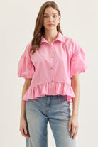 Pink Maggie ruffle hem top by ENTRO, casual 105 top with feminine ruffle details and a relaxed fit.