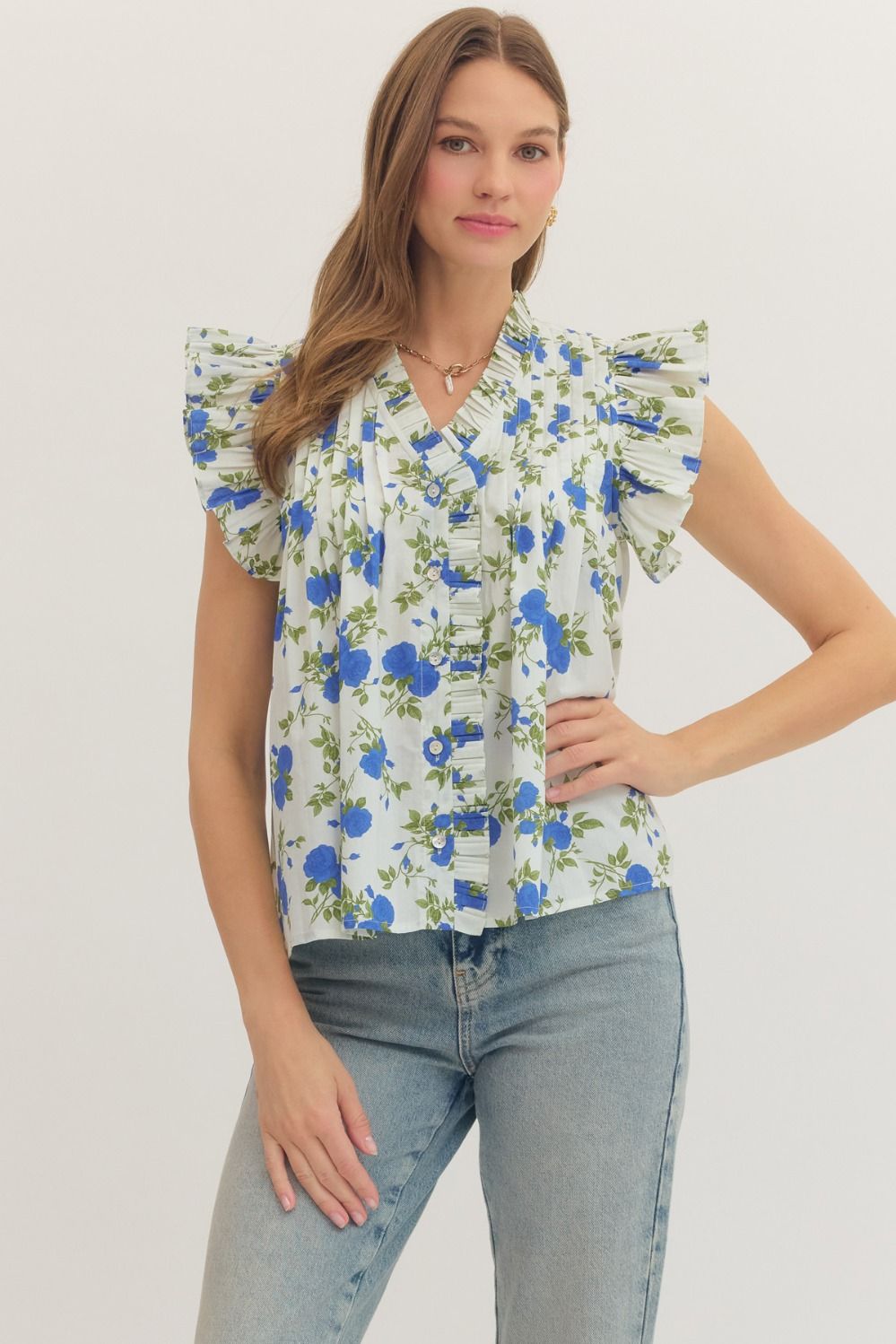 ENTRO Grace floral flutter sleeve top featuring a relaxed fit and vibrant floral pattern, perfect for casual wear.