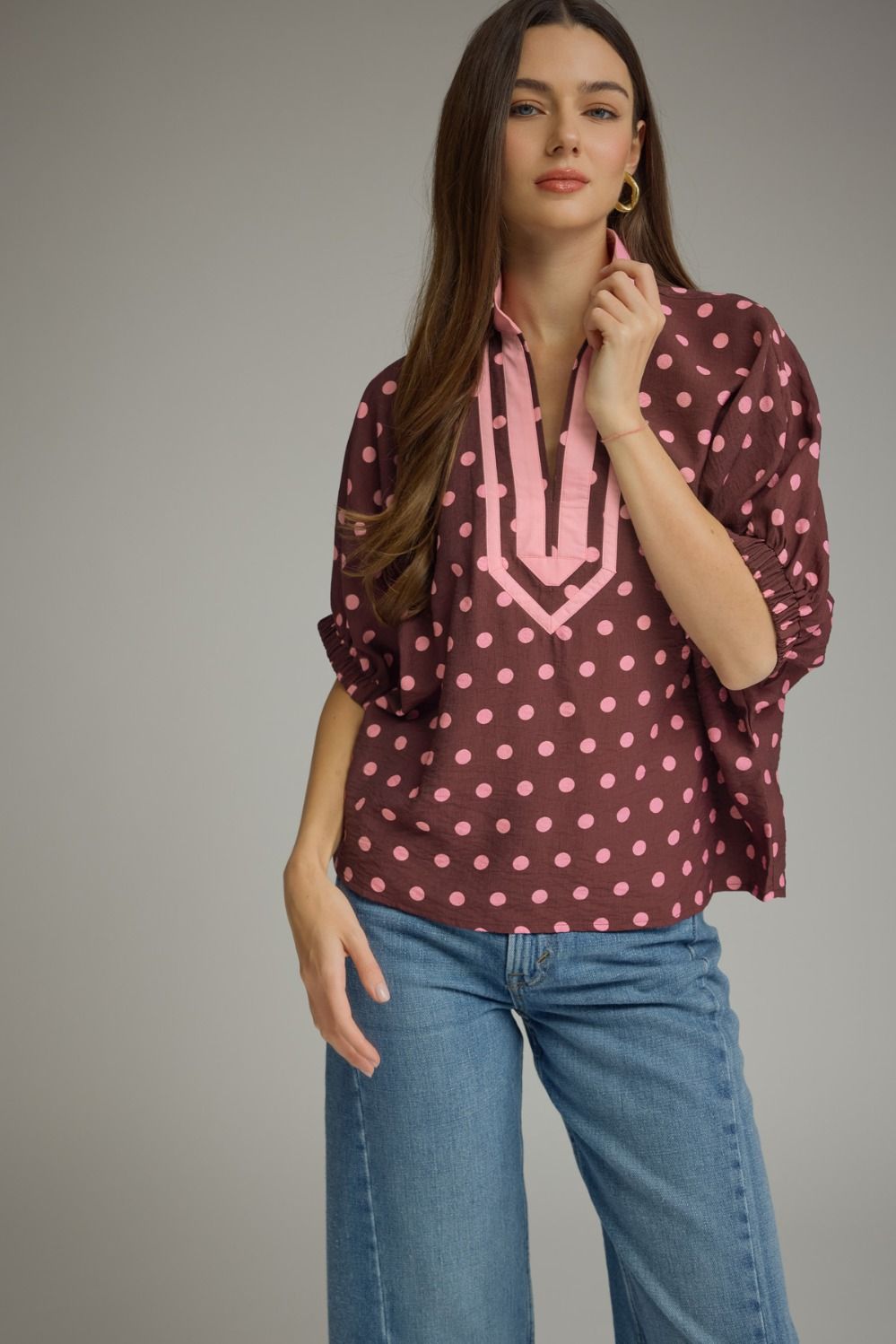 Emmie Polka Dot Split Neck Top by ENTRO, a stylish 110 dressy top with a polka dot pattern and split neckline.