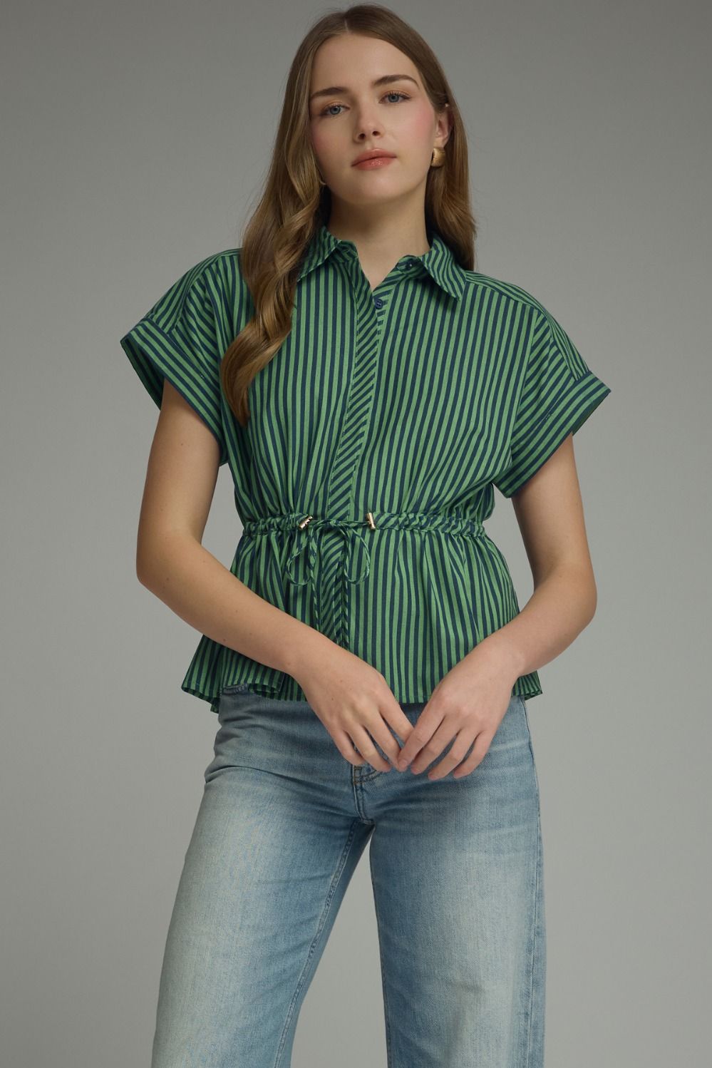 Entro Cindy pin-striped peplum top from the 110 dressy tops collection, featuring a fitted silhouette with striped fabric.