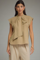 Striped Junie cap sleeve top by ENTRO, a stylish dressy top with a fitted design, perfect for casual or semi-formal occasions.