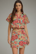 Kendall floral printed puff sleeve top by ENTRO, stylish dressy blouse with vibrant floral pattern and puff sleeves.