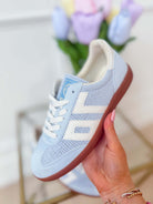 Sky blue BACK70 Ghost Sneakers, 205 model, featuring sleek design and comfortable fit, shown on a white background.